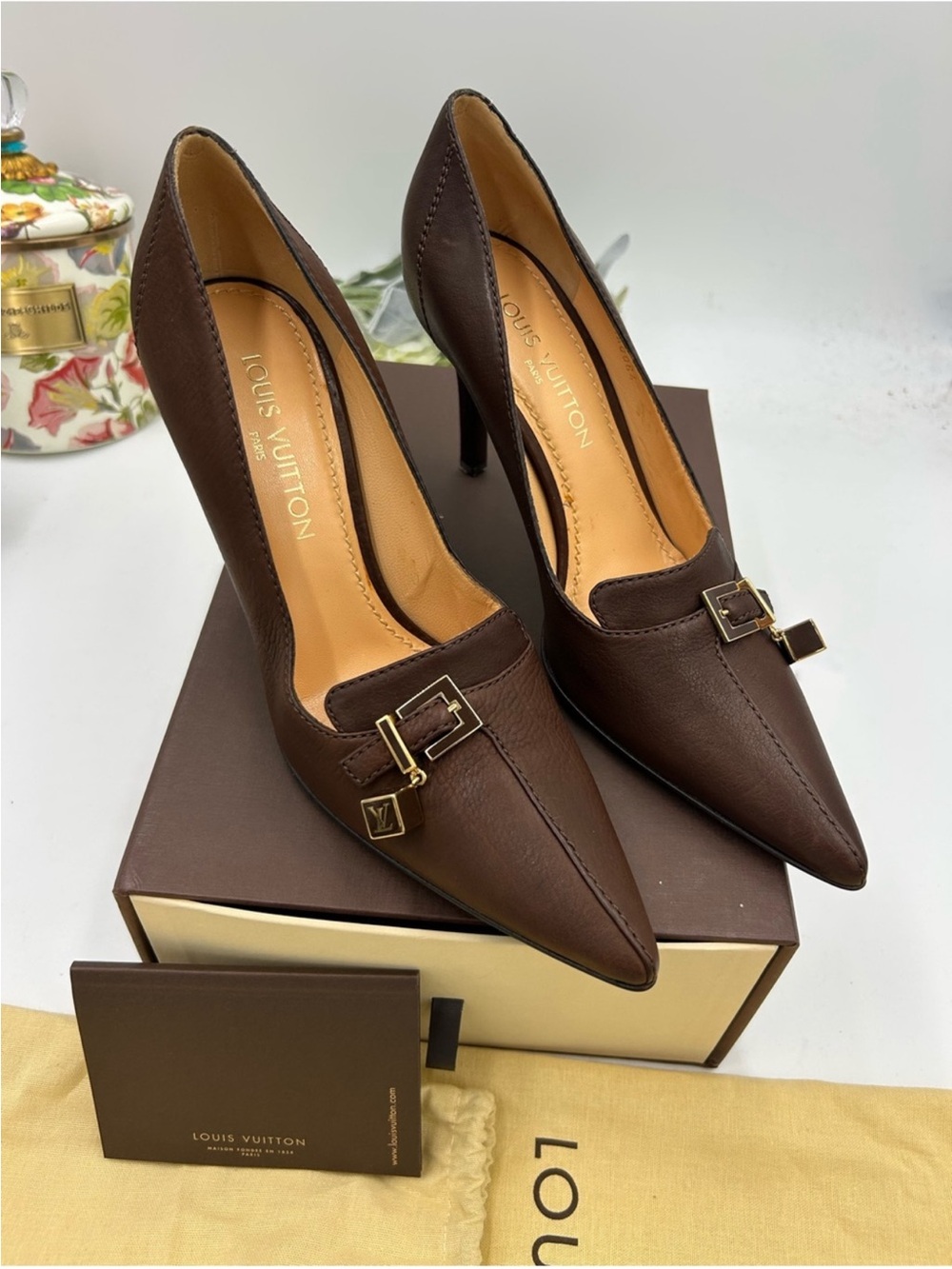 Women’s Louis Vuitton leather pumps with distinctive metal accent size 39.5
